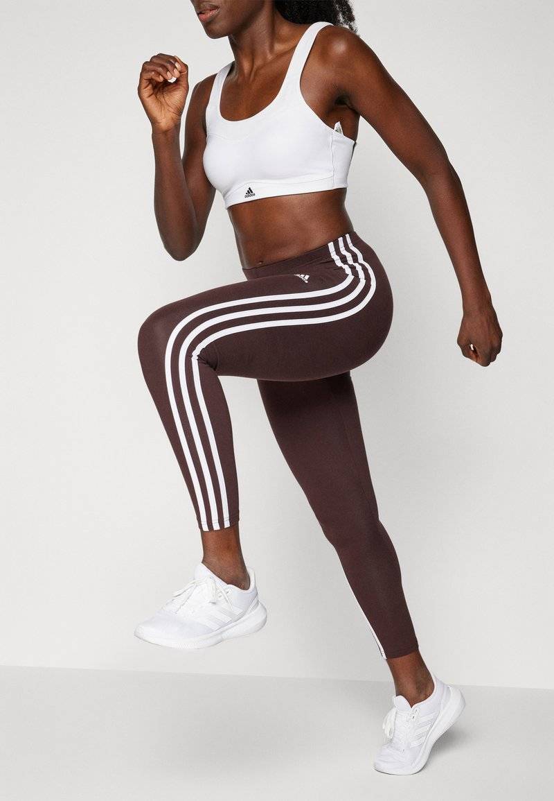 adidas Sportswear adidas Sportswear ESSENTIALS 3 STRIPES HIGH WAISTED - Leggings - shadow brown Lagerräumung