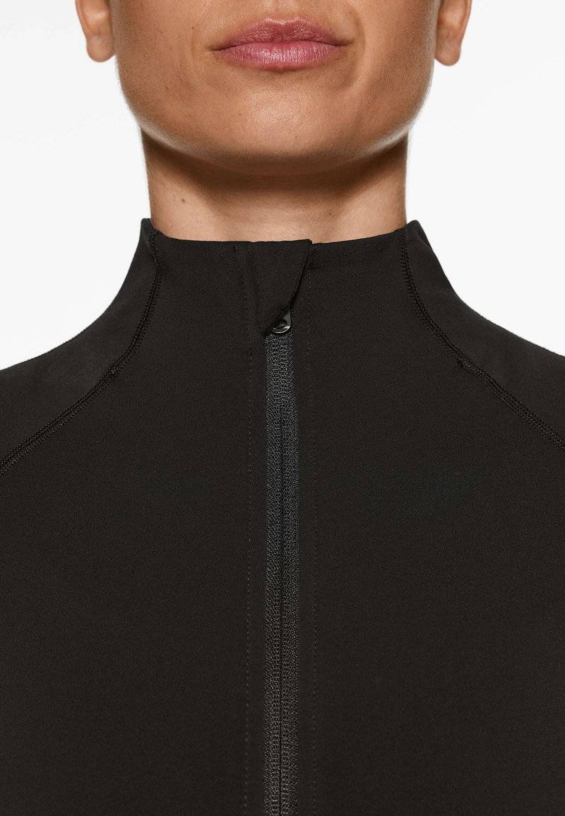OYSHO OYSHO WARMTH COMFORTLUX TECHNICAL - Training jacket - black Bestseller