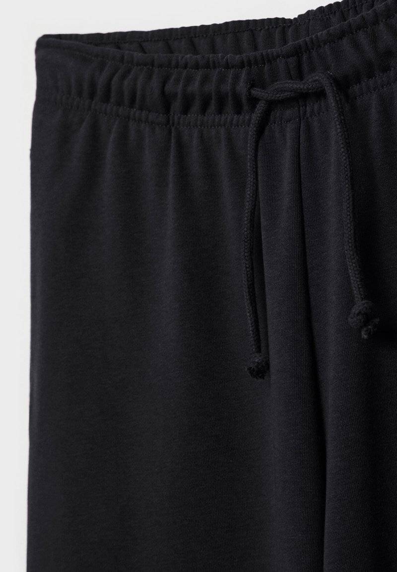 Stradivarius Stradivarius WIDE-LEG JOGGER - Tracksuit bottoms - black Speichern exportieren