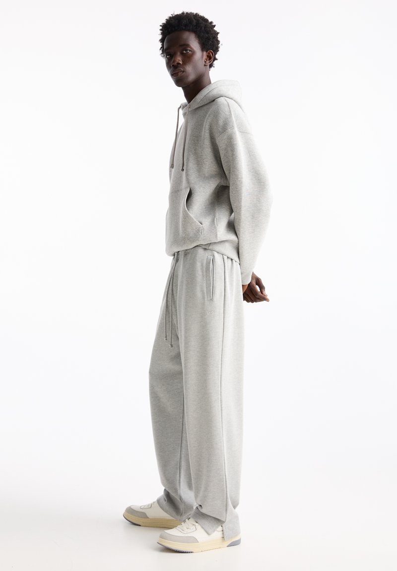 PULL&BEAR PULL&BEAR WIDE JOGGERS - Tracksuit bottoms - light grey Im Verkauf