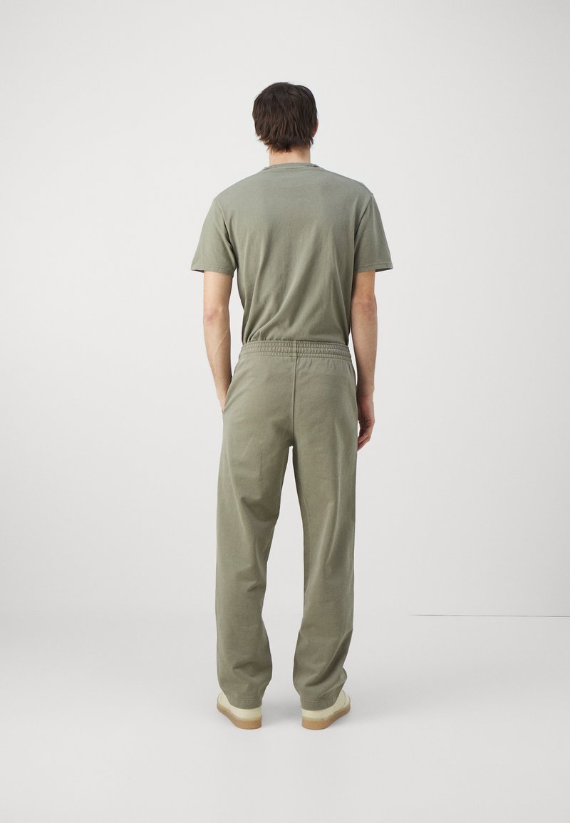 Holzweiler Holzweiler LAGOON OSLO TROUSERS UNISEX - Tracksuit bottoms - green Tiefpreis