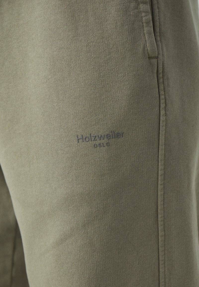Holzweiler Holzweiler LAGOON OSLO TROUSERS UNISEX - Tracksuit bottoms - green Tiefpreis