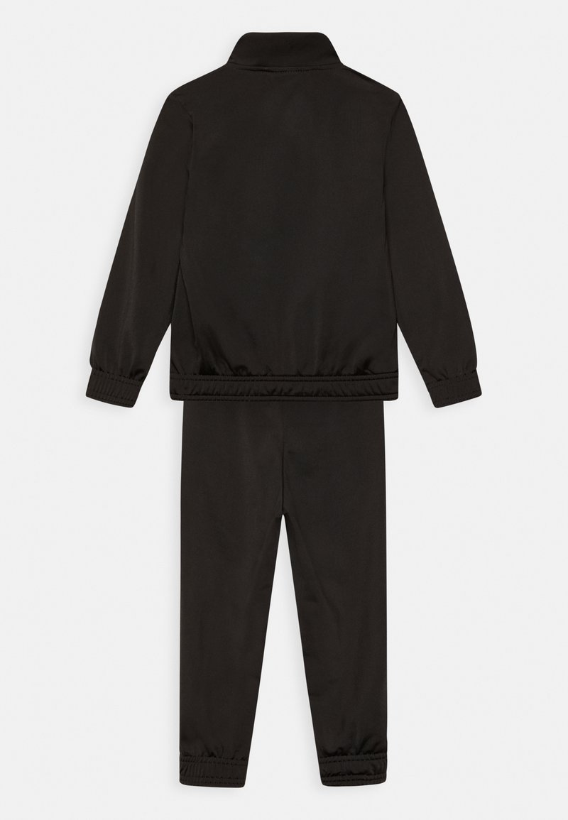 Puma Puma SUIT UNISEX SET - Tracksuit - puma black 50% Rabatt für begrenzte Zeit