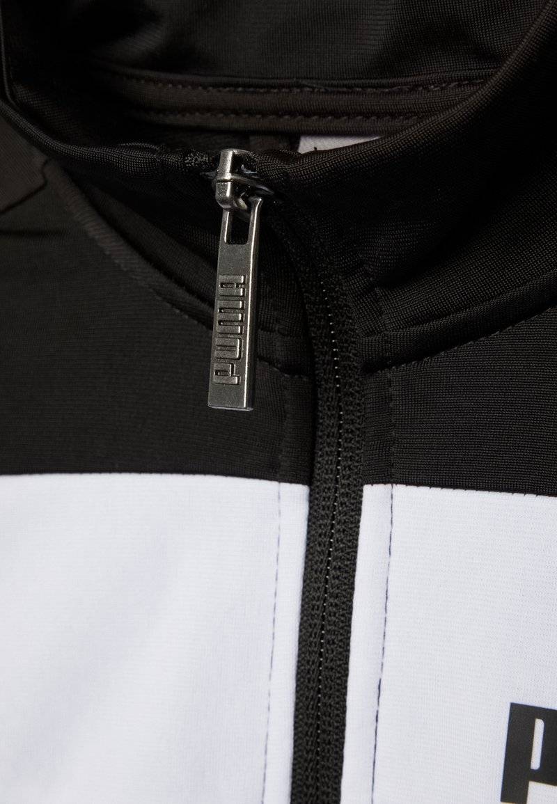 Puma Puma SUIT UNISEX SET - Tracksuit - puma black 50% Rabatt für begrenzte Zeit