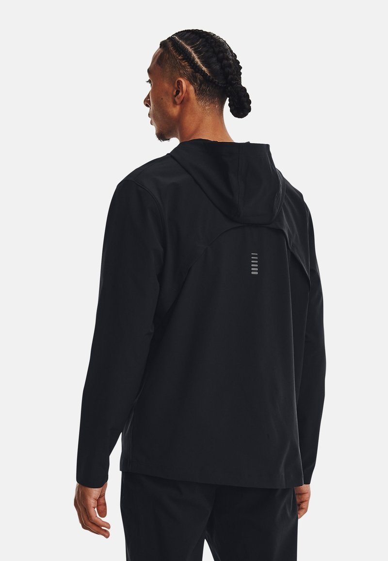 Under Armour Under Armour OUT THE STORM - Running jacket - black jet gray reflective Weihnachtsangebot