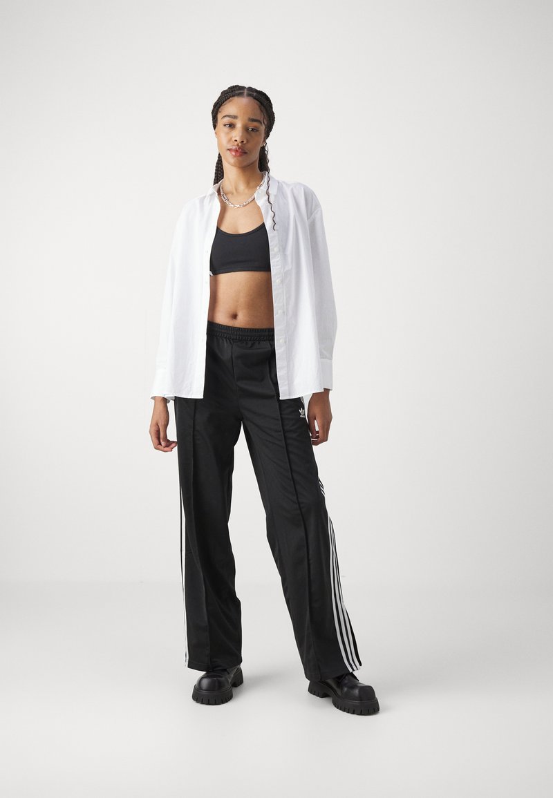adidas Originals adidas Originals FBIRD LOOSE - Tracksuit bottoms - black Bis zu 65% Rabatt