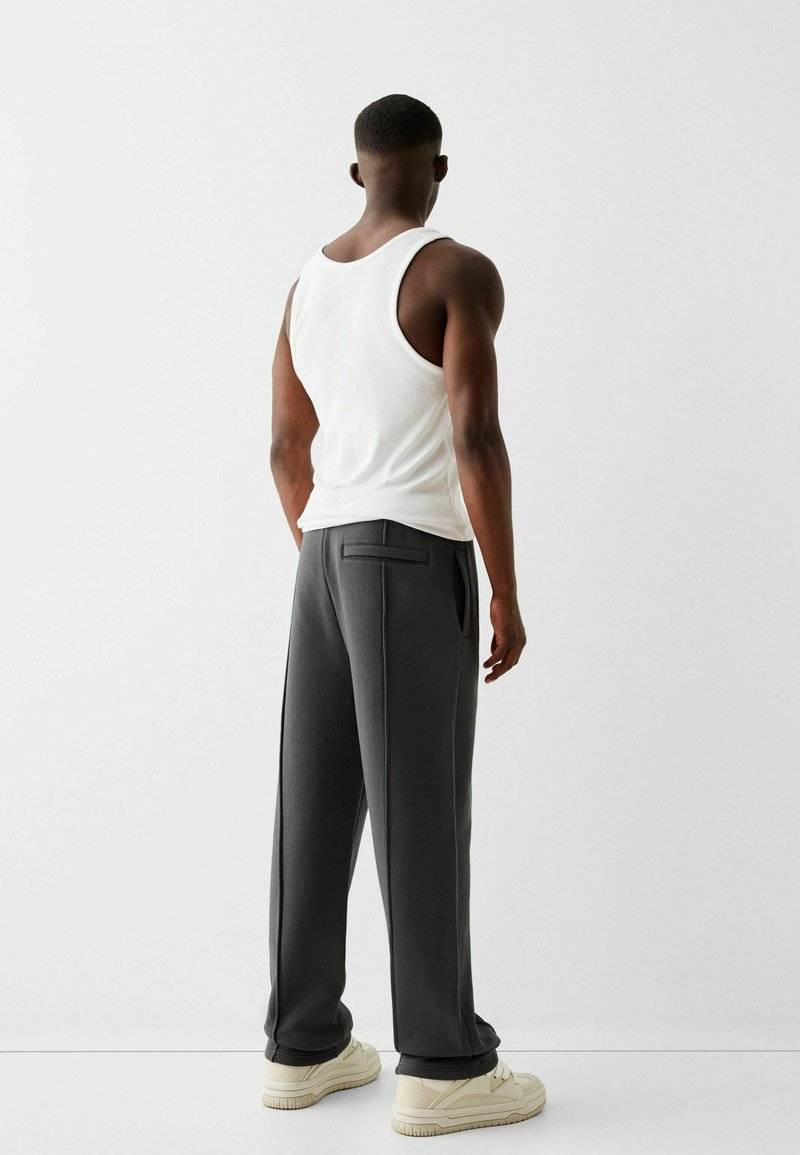 Bershka Bershka WIDE - Tracksuit bottoms - dark grey Riesige Rabatte