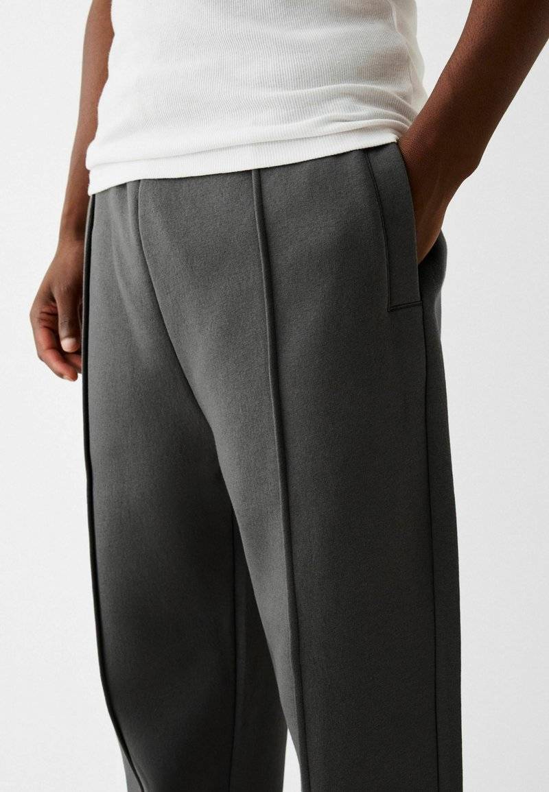 Bershka Bershka WIDE - Tracksuit bottoms - dark grey Riesige Rabatte