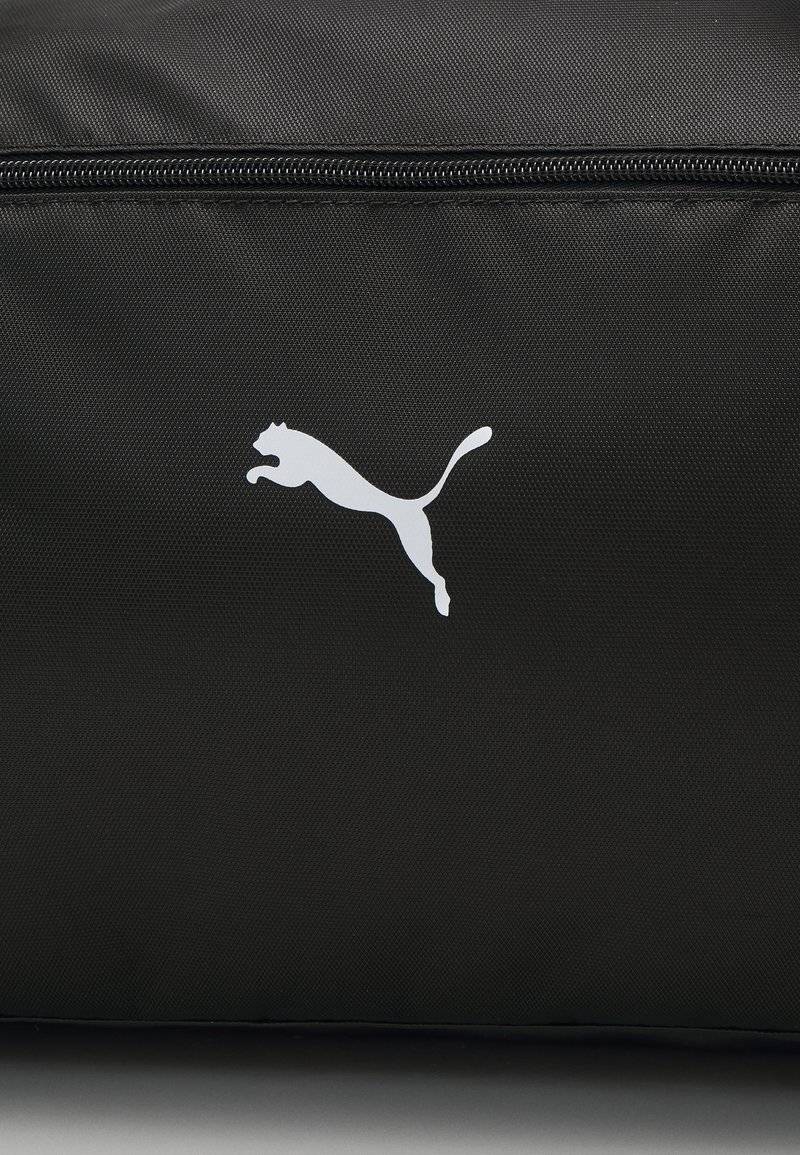 Puma Puma SPORT BAG - Sports bag - black Kostenloser Versand
