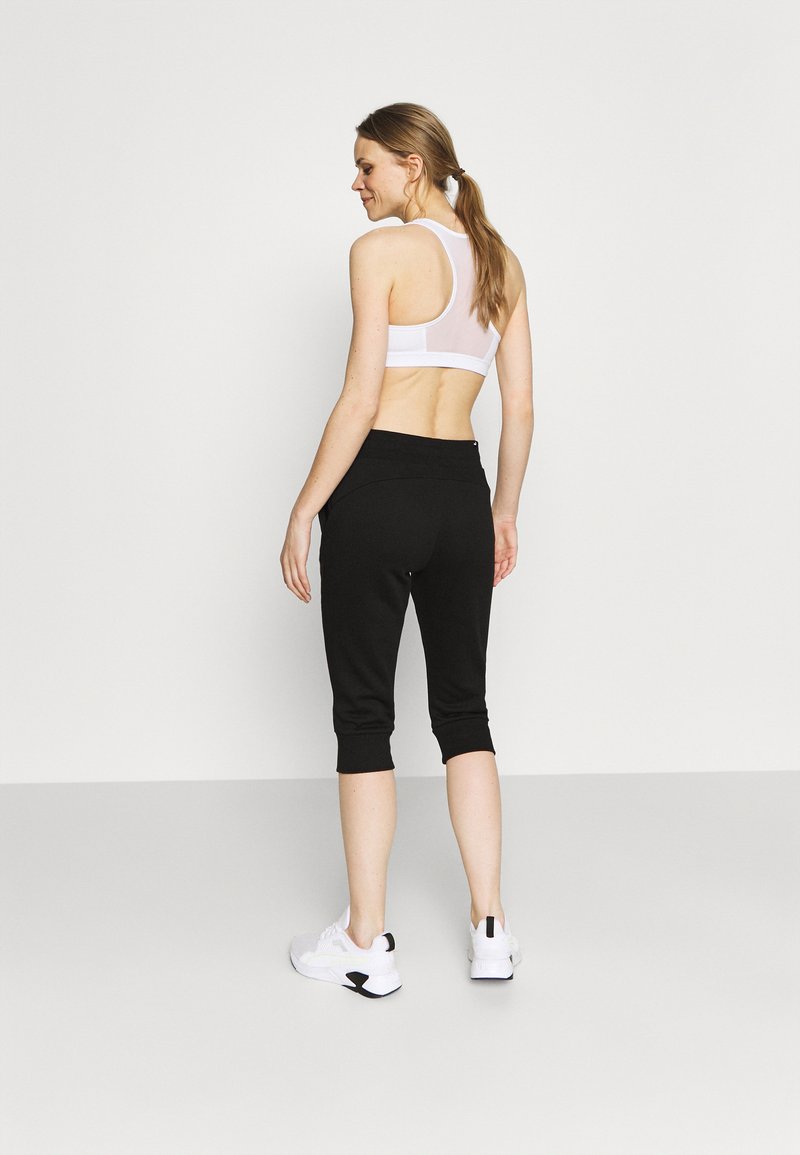 Puma Puma CAPRI - 3/4 sports trousers - black Riesige Rabatte
