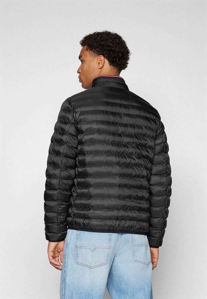 Tommy Hilfiger Tommy Hilfiger PACKABLE - Light jacket - black Angebote