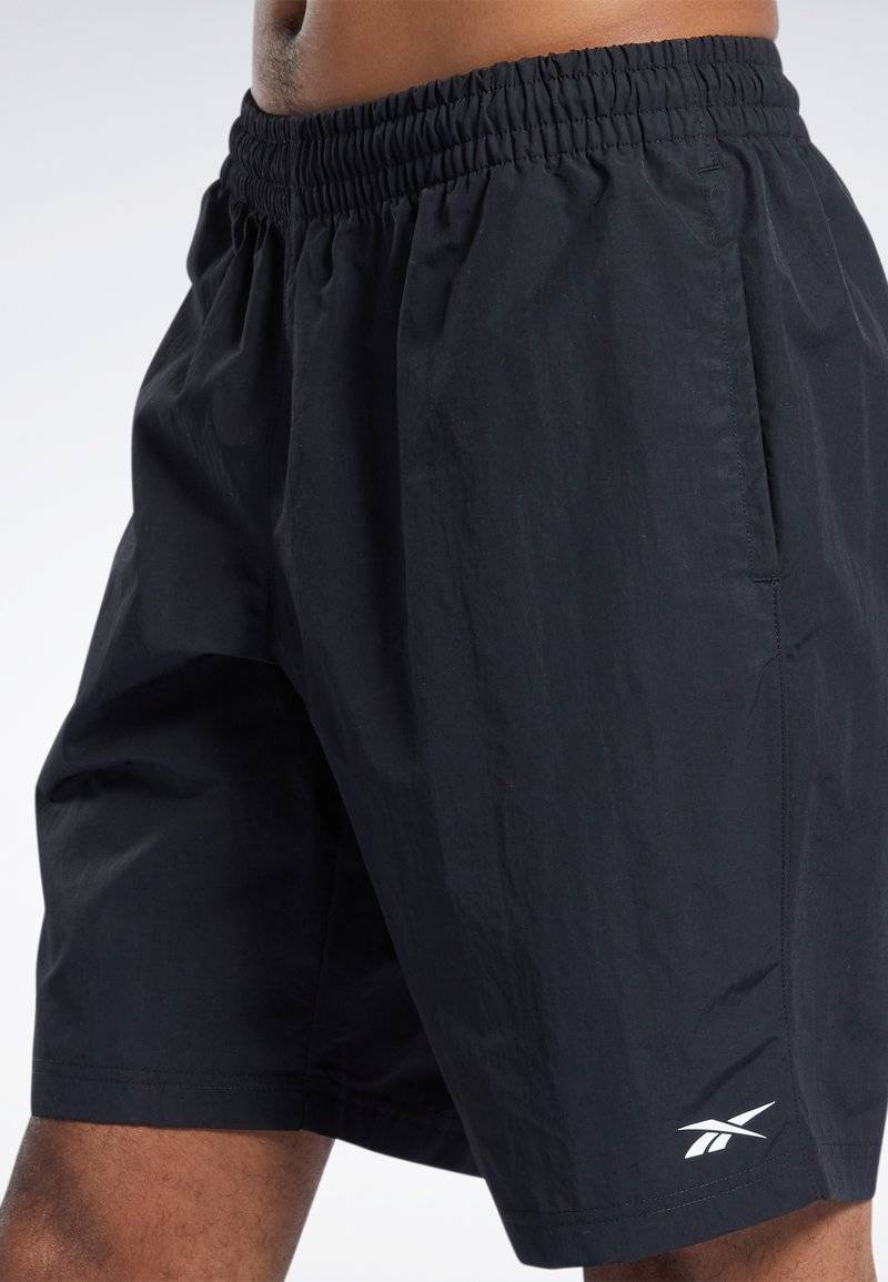 Reebok Reebok ID TRAIN UTILITY - Sports shorts - black Rabatt