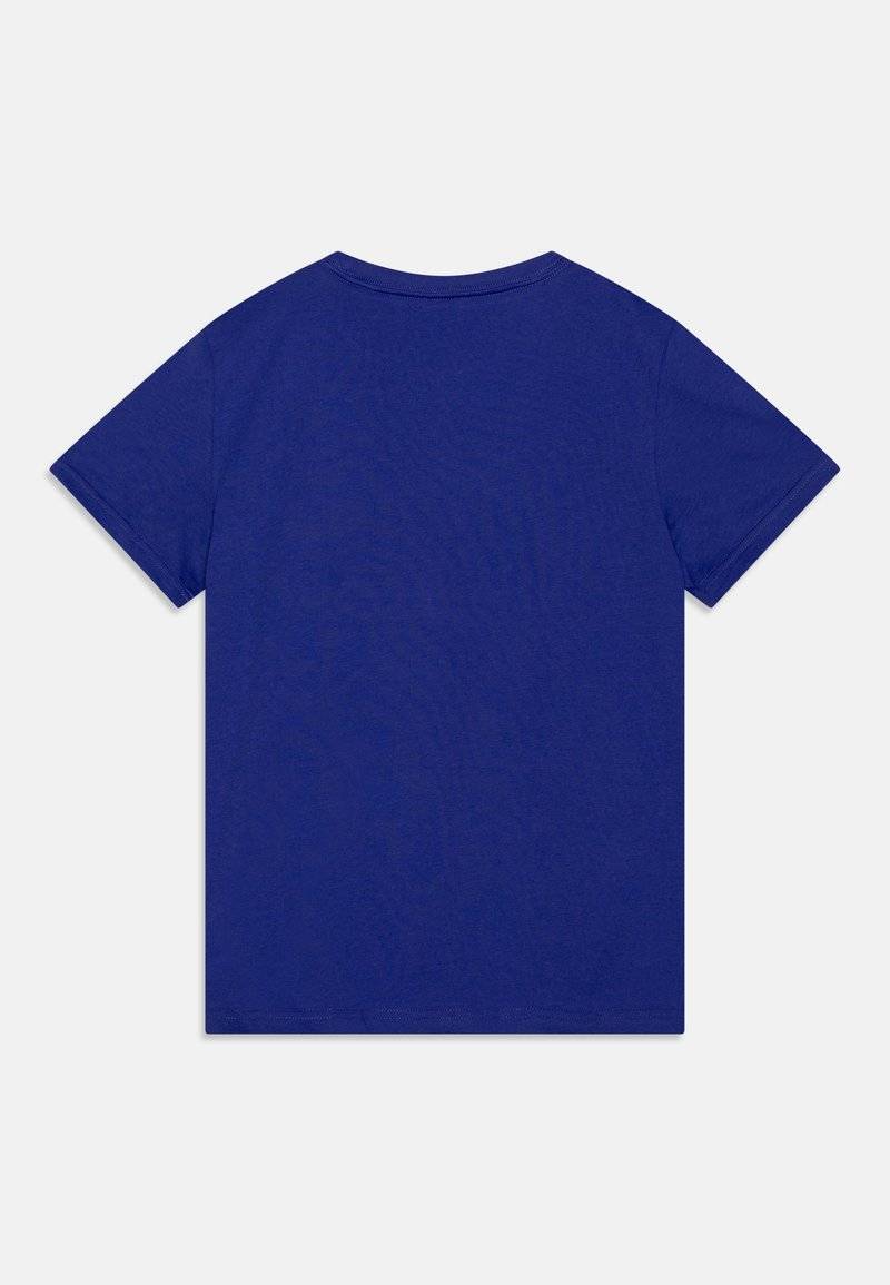 Puma Puma LOGO TEE UNISEX - Print T-shirt - lapis lazuli Großer Ausverkauf