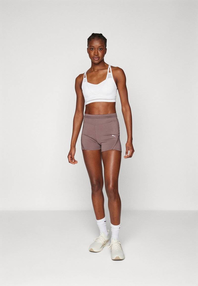 Puma Puma PAMELA REIF SHORTS	 - Leggings - damson plum im Angebot