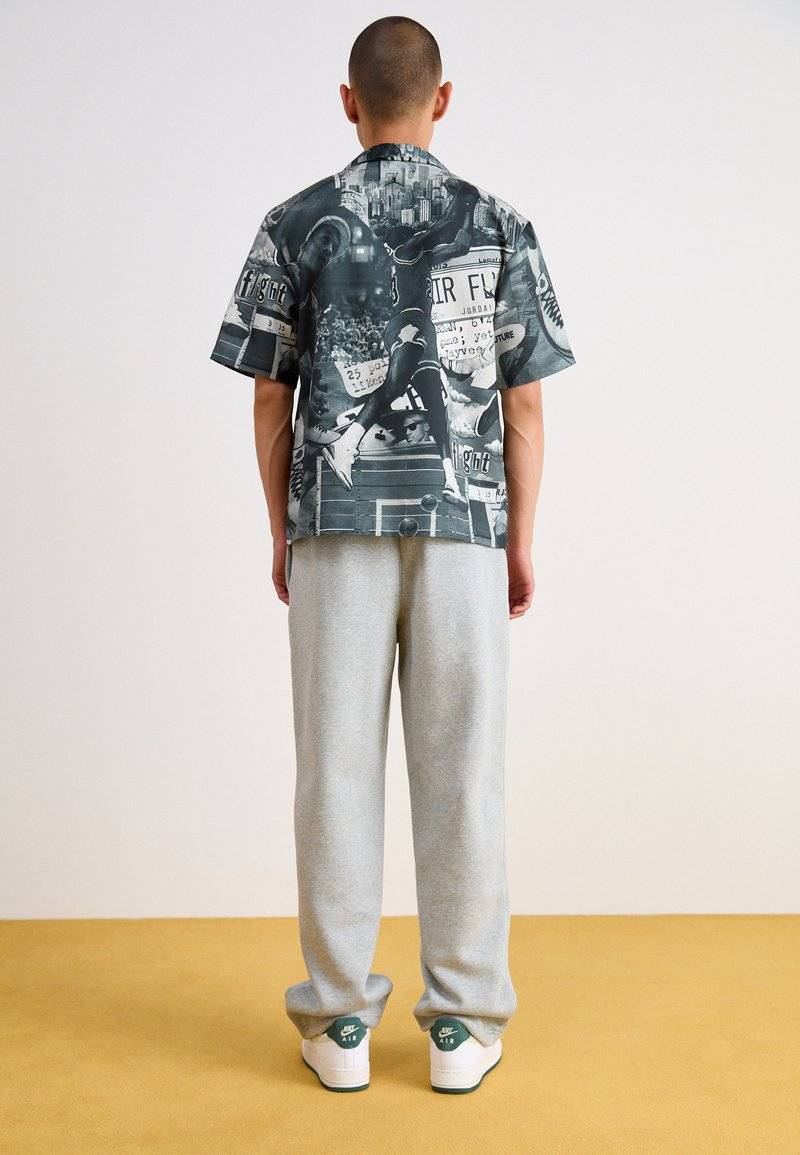 Nike Sportswear Nike Sportswear BUNGIE PANT - Tracksuit bottoms - grey heather Online Outlet
