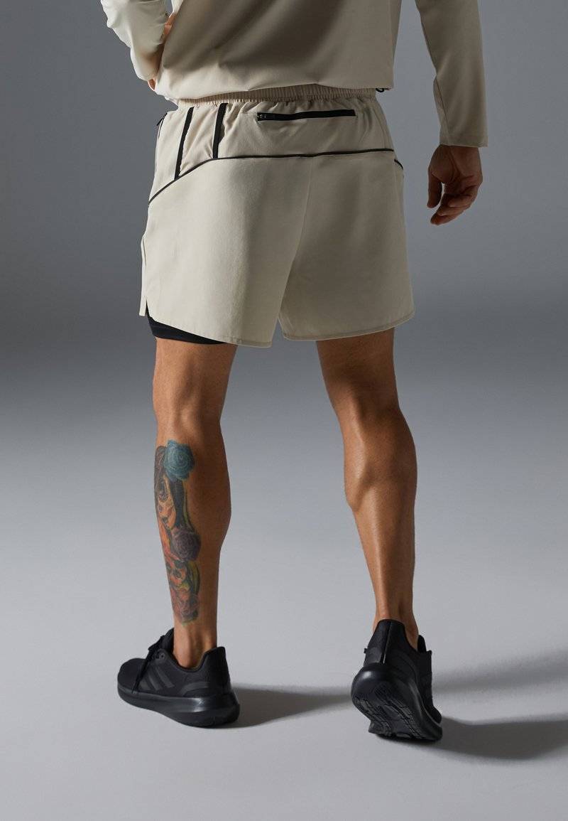 Pier One Sport Pier One Sport Sports shorts - beige Speichern exportieren