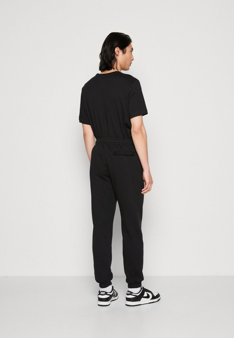 Nike Sportswear Nike Sportswear CLUB CF BB - Tracksuit bottoms - black Versandkostenfrei