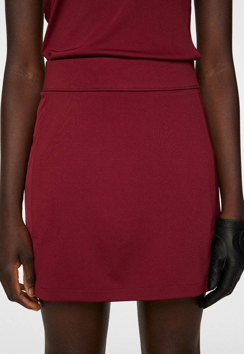 J.LINDEBERG Sports J.LINDEBERG Sports AMELIE MID - Sports skirt - cabernet Black Friday