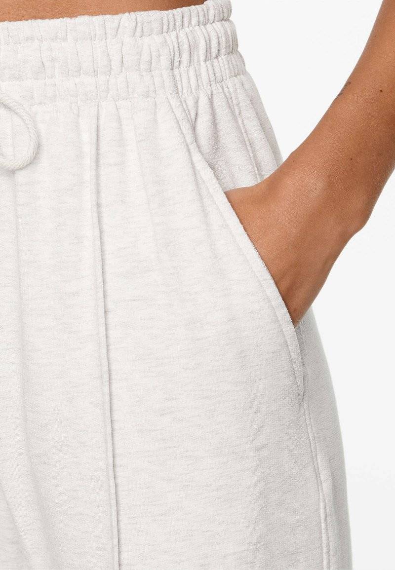 OYSHO OYSHO SOFT TOUCH RELAXED STRAIGHT-LEG - Tracksuit bottoms - mottled light grey Bestseller