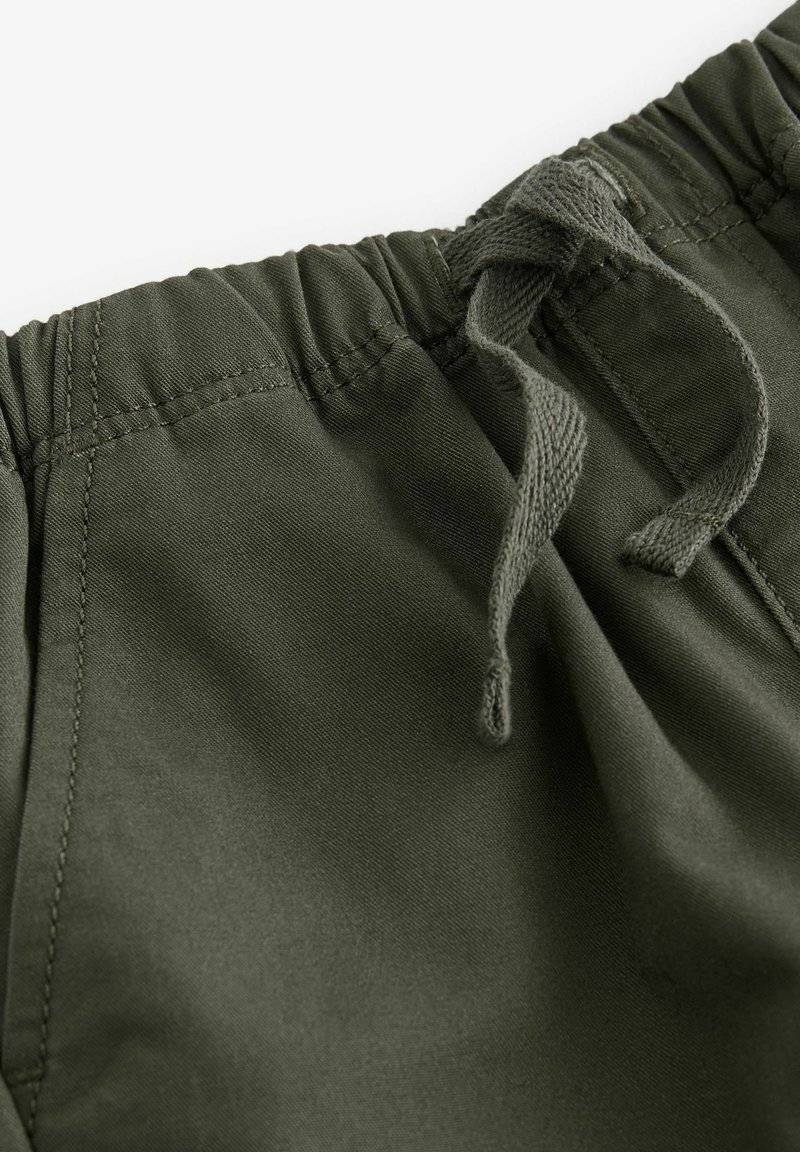 Next Next SIDE POCKET PULL-ON STANDARD - Trousers - khaki green Auslauf