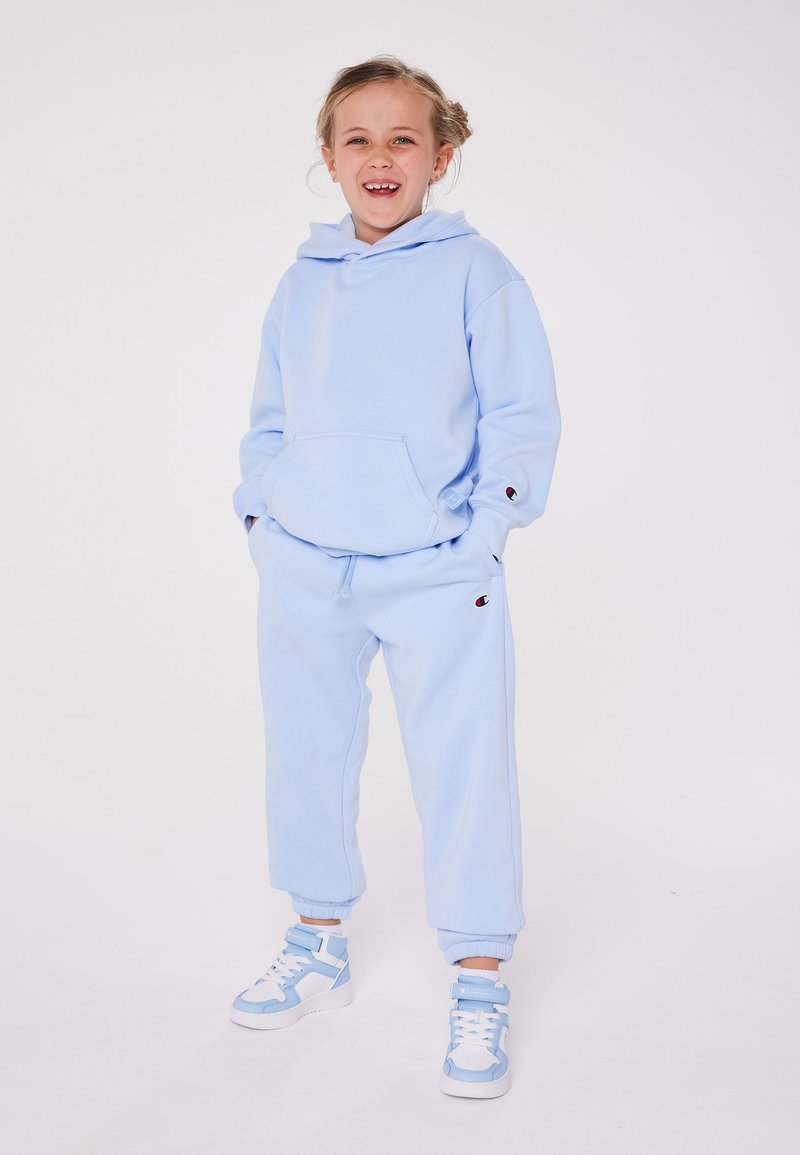 Champion Champion EXCLUSIVE PANT UNISEX - Tracksuit bottoms - light blue Jubiläumsangebot