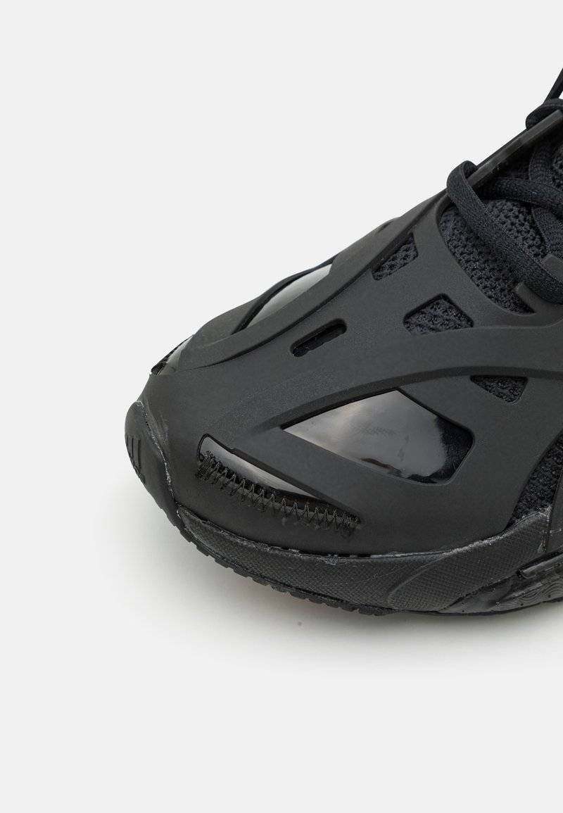 adidas by Stella McCartney adidas by Stella McCartney ADIDAS BY STELLA MCCARTNEY SOLAR GLIDE - Competition running shoes - core black Lagerräumung
