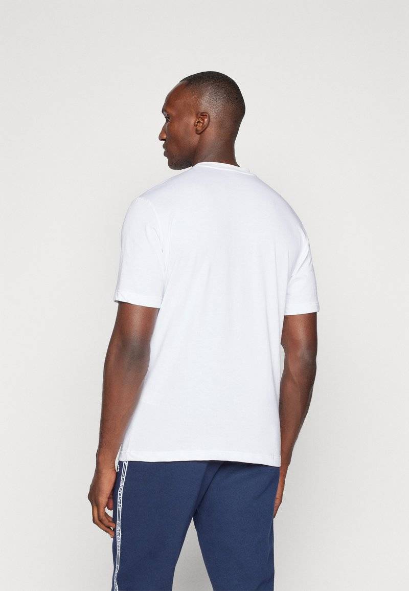 Lacoste Sport Lacoste Sport SPORTS - Basic T-shirt - white Heißer Verkauf