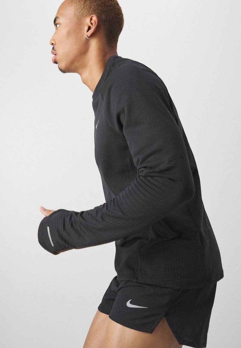 Nike Performance Nike Performance FAST SHORT - Sports shorts VIP-Rabatte