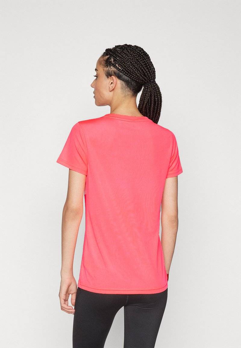 Puma Puma PERFORMANCE TEE - Sports T-shirt - sunset glow Black Friday Preise