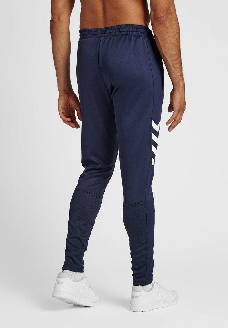 Hummel Hummel CORE XR TRAINING PANTS - Tracksuit bottoms - marine Verkauf