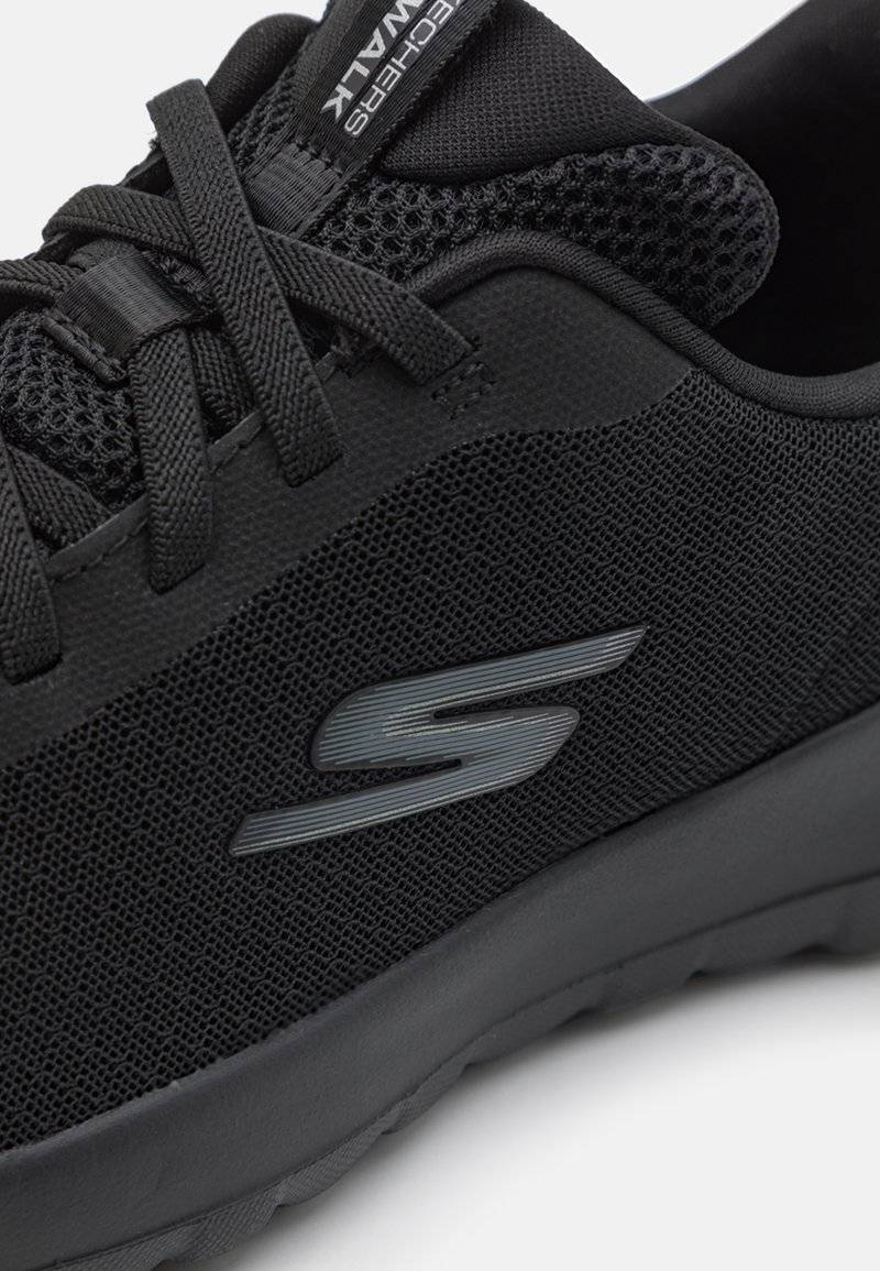 Skechers Performance Skechers Performance GO WALK BUNGEE - Walking trainers - black Fabrikverkauf