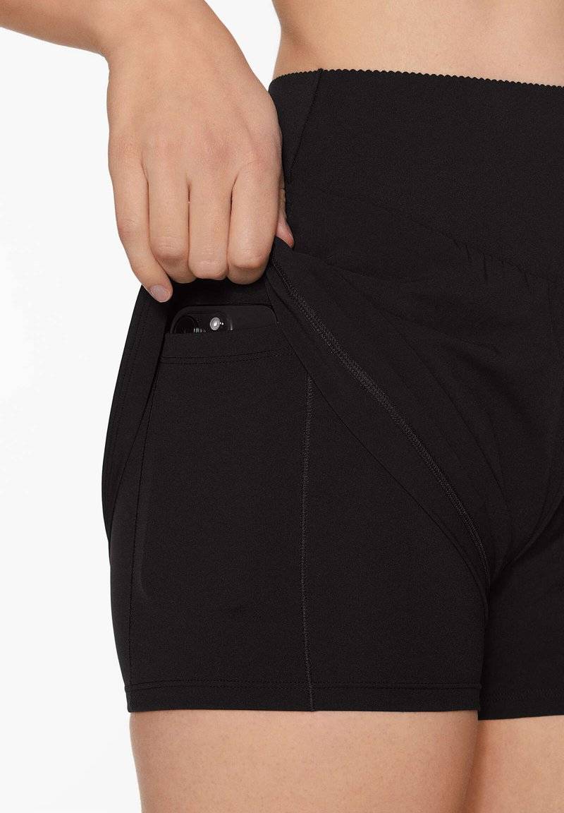 OYSHO OYSHO COMPRESSIVE - Sports shorts - black Meist gekauft